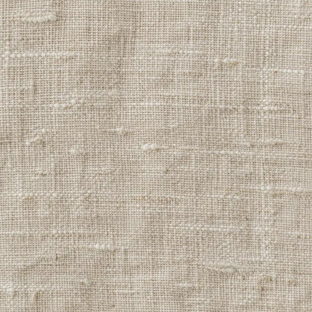 Close-up of natural linen fabric showing visible weave and slub texture